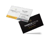 HAMLEDOOR çelik kapı firmasına ait siyah ve beyaz renkli iki farklı kartvizit; biri iletişim bilgilerini, diğeri sloganı içeriyor.